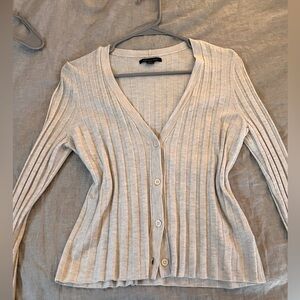 an off-white/cream long sleeve v-neck with buttons. from
american eagle.